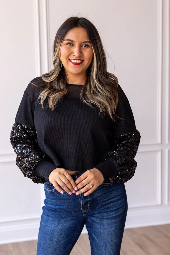 BLACK WAFFLE WITH SEQUIN SLEEVE
